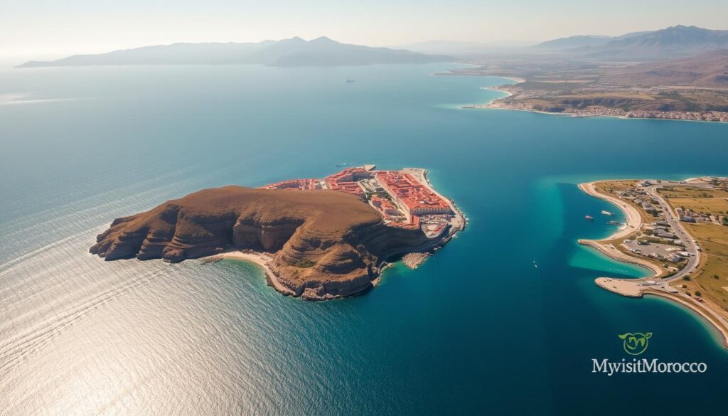 a detailed aerial view of the Strait of Gibraltar, the narrow waterway connecting the Atlantic Ocean and the Mediterranean Sea, with the Spanish city of Ceuta and the Moroccan coastline on either side, bathed in warm afternoon sunlight. In the foreground, the crystalline blue waters of the strait with ships and boats dotting the surface. In the middle ground, the rugged, sun-drenched terrain of the Spanish exclave of Ceuta, its distinctive red-roofed buildings and fortified walls visible. In the background, the dramatic silhouette of the Rif Mountains in Morocco, their peaks shrouded in hazy light. The overall scene conveys the geographic proximity and connection between Spain and Morocco, with the MyVisitMorocco logo subtly incorporated. a detailed aerial view of the Strait of Gibraltar, the narrow waterway connecting the Atlantic Ocean and the Mediterranean Sea, with the Spanish city of Ceuta and the Moroccan coastline on either side, bathed in warm afternoon sunlight. In the foreground, the crystalline blue waters of the strait with ships and boats dotting the surface. In the middle ground, the rugged, sun-drenched terrain of the Spanish exclave of Ceuta, its distinctive red-roofed buildings and fortified walls visible. In the background, the dramatic silhouette of the Rif Mountains in Morocco, their peaks shrouded in hazy light. The overall scene conveys the geographic proximity and connection between Spain and Morocco, with the MyVisitMorocco logo subtly incorporated.