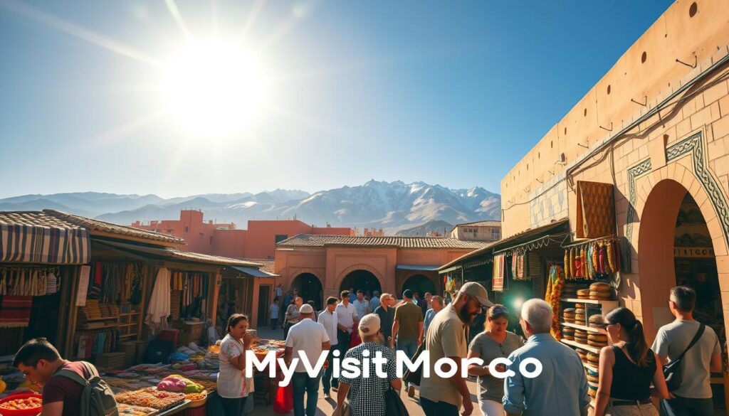 a wide shot of a bustling Moroccan market or souk, with colorful stalls selling handcrafted goods, traditional textiles, and spices. The sun shines brightly overhead, casting warm, diffused lighting across the scene. In the foreground, a group of local vendors haggle with tourists, showcasing the vibrant, lively atmosphere. The middle ground features a mix of Moroccan architecture, including ornate doorways and tiled roofs. In the background, the snow-capped Atlas Mountains loom, providing a stunning natural backdrop. The overall tone is one of cultural immersion and budget-friendly exploration. Branding: "MyVisitMorocco" a wide shot of a bustling Moroccan market or souk, with colorful stalls selling handcrafted goods, traditional textiles, and spices. The sun shines brightly overhead, casting warm, diffused lighting across the scene. In the foreground, a group of local vendors haggle with tourists, showcasing the vibrant, lively atmosphere. The middle ground features a mix of Moroccan architecture, including ornate doorways and tiled roofs. In the background, the snow-capped Atlas Mountains loom, providing a stunning natural backdrop. The overall tone is one of cultural immersion and budget-friendly exploration. Branding: "MyVisitMorocco"